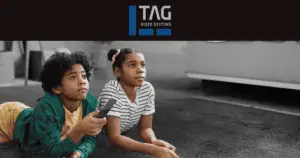 Two kids watching TV